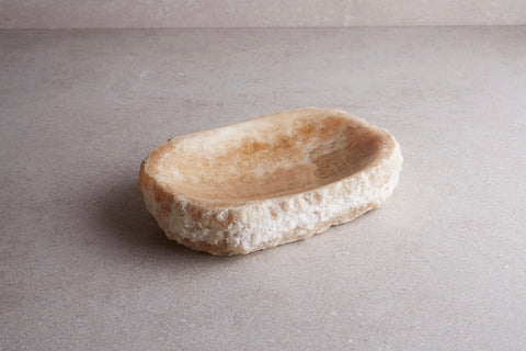 a stone bowl on a counter