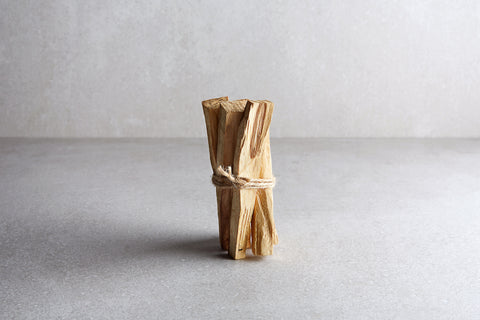 a bundle of wood tied to a rope