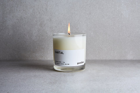 a candle in a glass jar